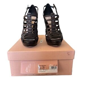 Miu Miu black leather platform sandals with cutout design